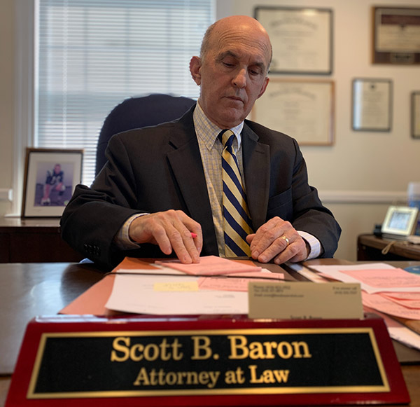 Attorney Baron at his desk